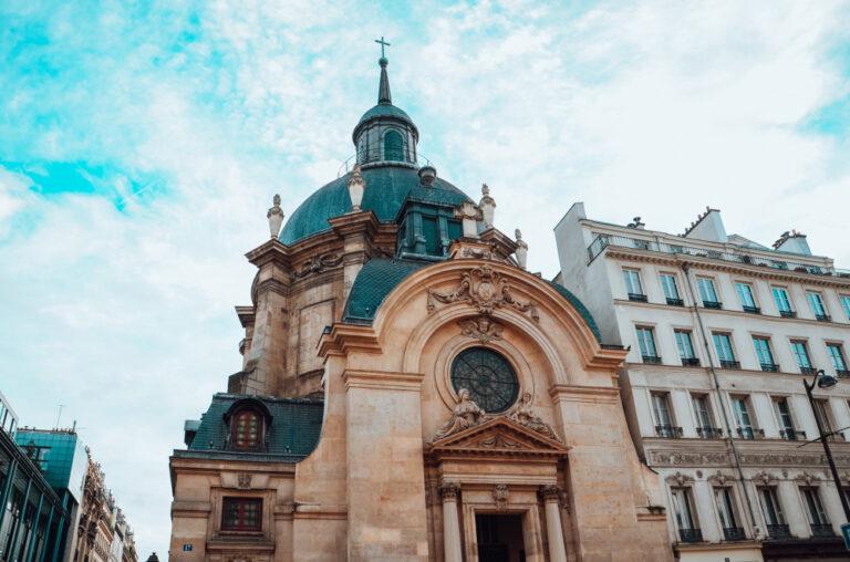 the temple du marais and a cloudy sky in paris, france